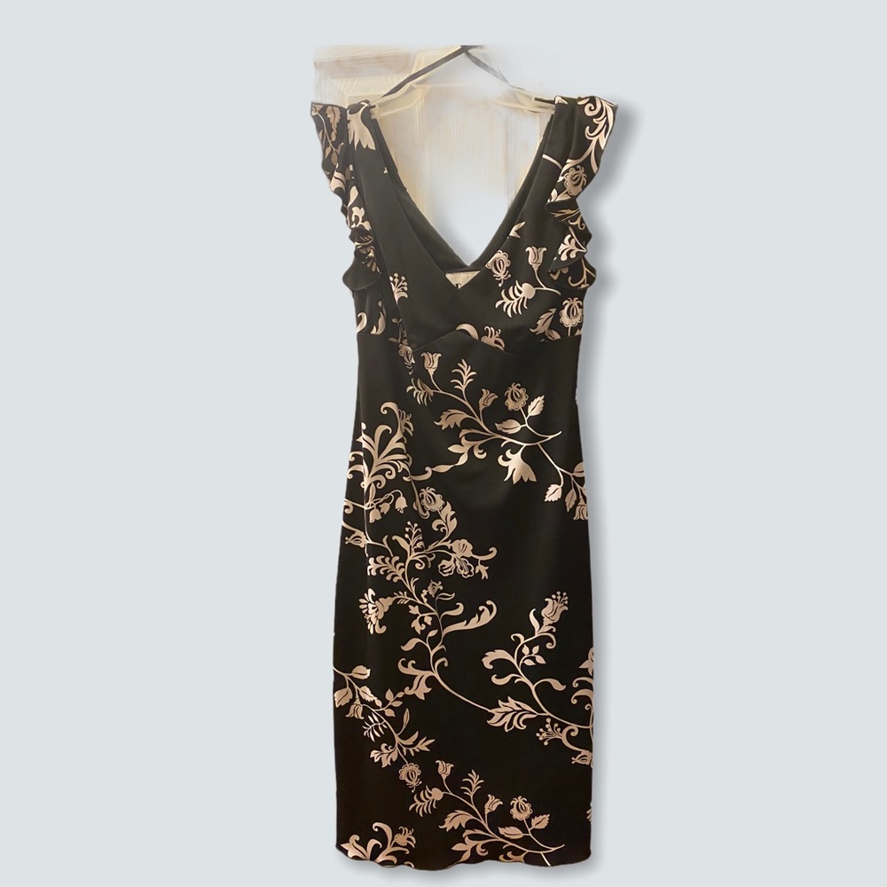 Beautiful m-size woman’s dress b/w flower design.